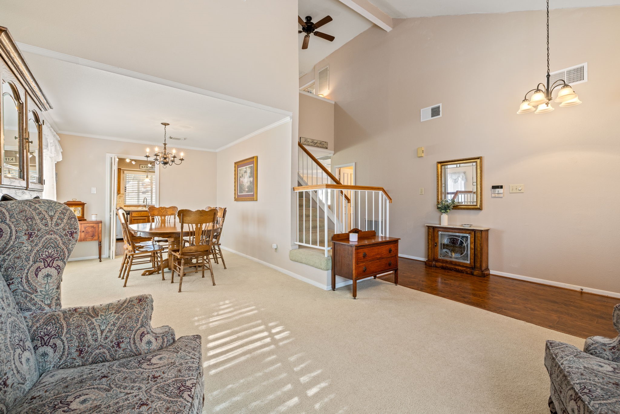 9102 Woodhouse Drive Spring, TX 77379 - Photo 6 of 32 DINING ROOM - This view shows the dining room, and how it opens to the kitchen. There are double doors that can be used if you want to close off the kitchen. Notice the vaulted ceiling in the entry and main hallway.