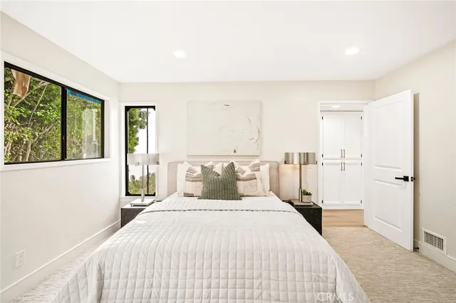 a view of a balcony with a tree