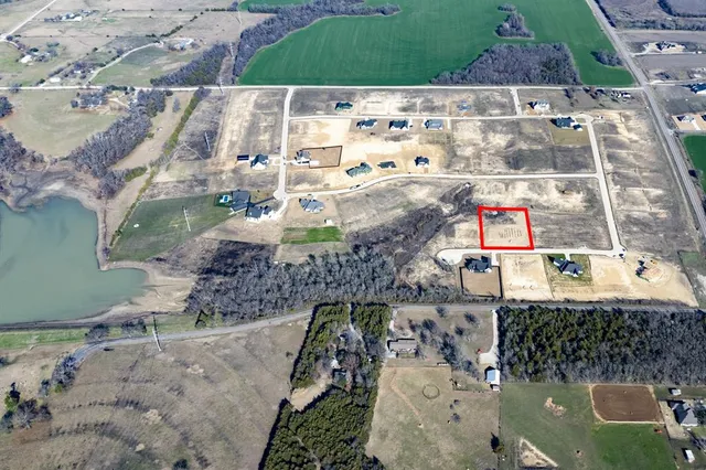 a view of swimming pool with a yard