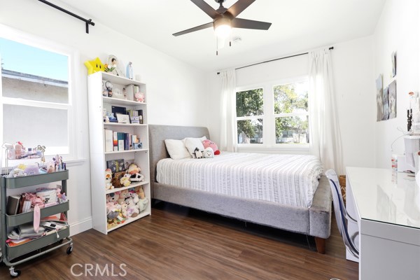 4866 Sunnyside Drive Riverside, CA 92506 - Photo 18 of 29 a bedroom with a bed furniture and a window