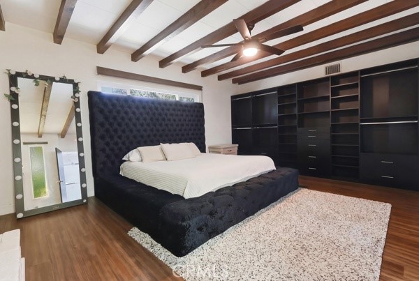 4866 Sunnyside Drive Riverside, CA 92506 - Photo 21 of 29 a bedroom with a bed and a dresser