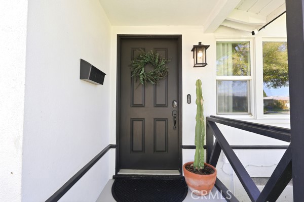 4866 Sunnyside Drive Riverside, CA 92506 - Photo 5 of 29 a view of an entryway with wooden floor
