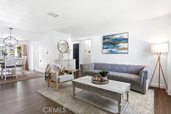 4866 Sunnyside Drive Riverside, CA 92506 - Photo 7 of 29 a living room with furniture and wooden floor