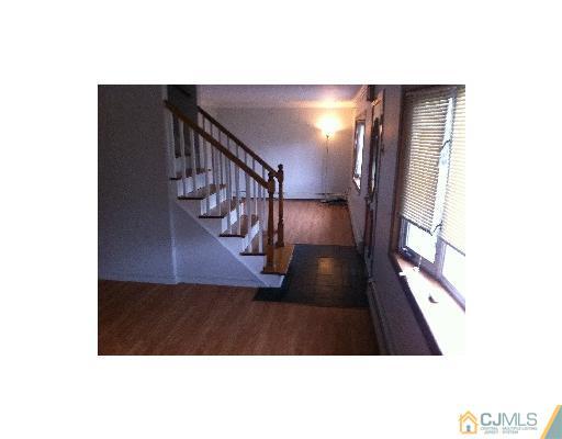 59 Middle Hill Road Colonia, NJ 07067 - Photo 4 of 25 a view of entryway with wooden floor