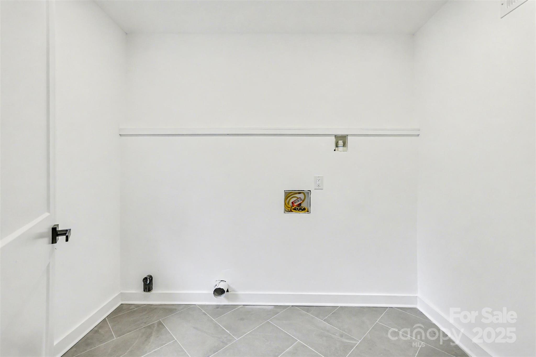 3417 Sudbury Road Charlotte, NC 28205 - Photo 14 of 18 a view of a utility room