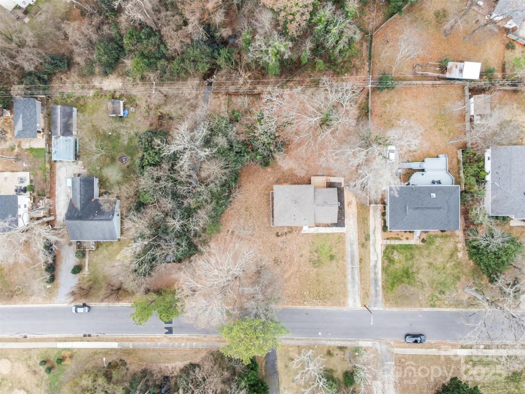 3417 Sudbury Road Charlotte, NC 28205 - Photo 16 of 18 an aerial view of residential houses with outdoor space