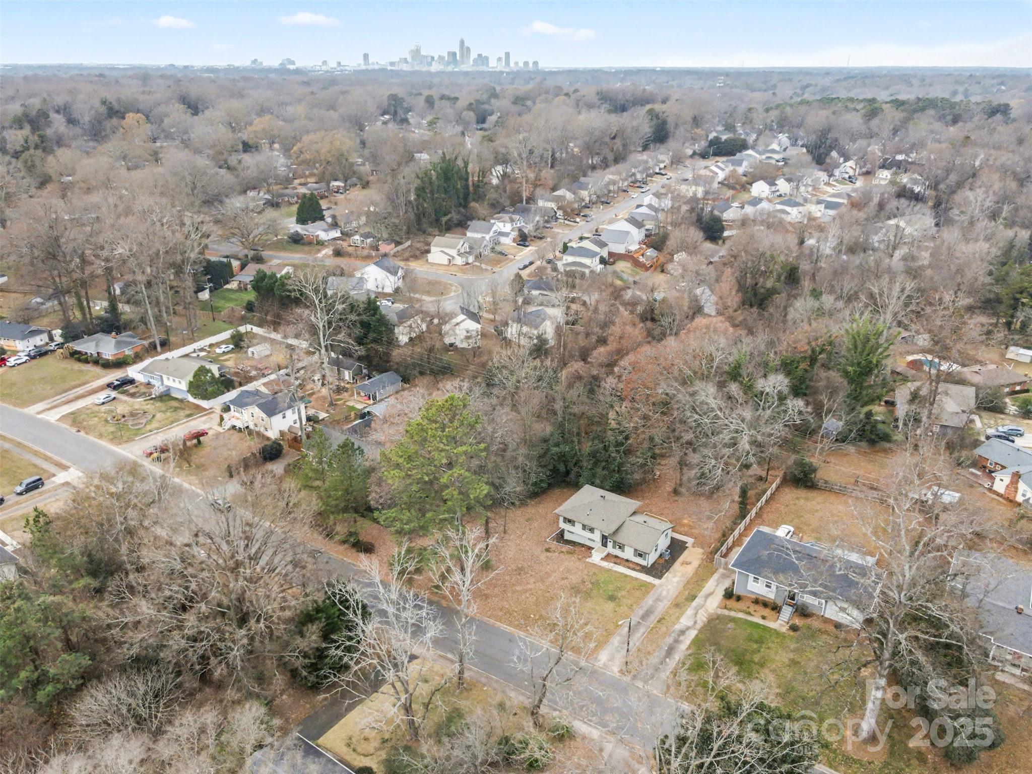 3417 Sudbury Road Charlotte, NC 28205 - Photo 17 of 18 an aerial view of a house with a mountain view
