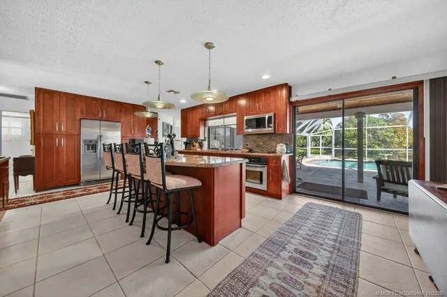 a view of yard with swimming pool and outdoor seating