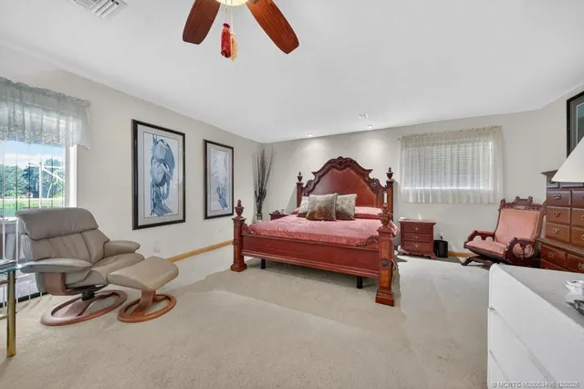 a bathroom with a mirror and a shower