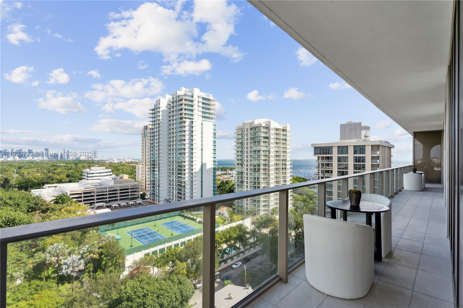 2678 Tigertail Avenue, Unit 1202 Miami, FL 33133 - Photo 18 of 20 a view of city from balcony