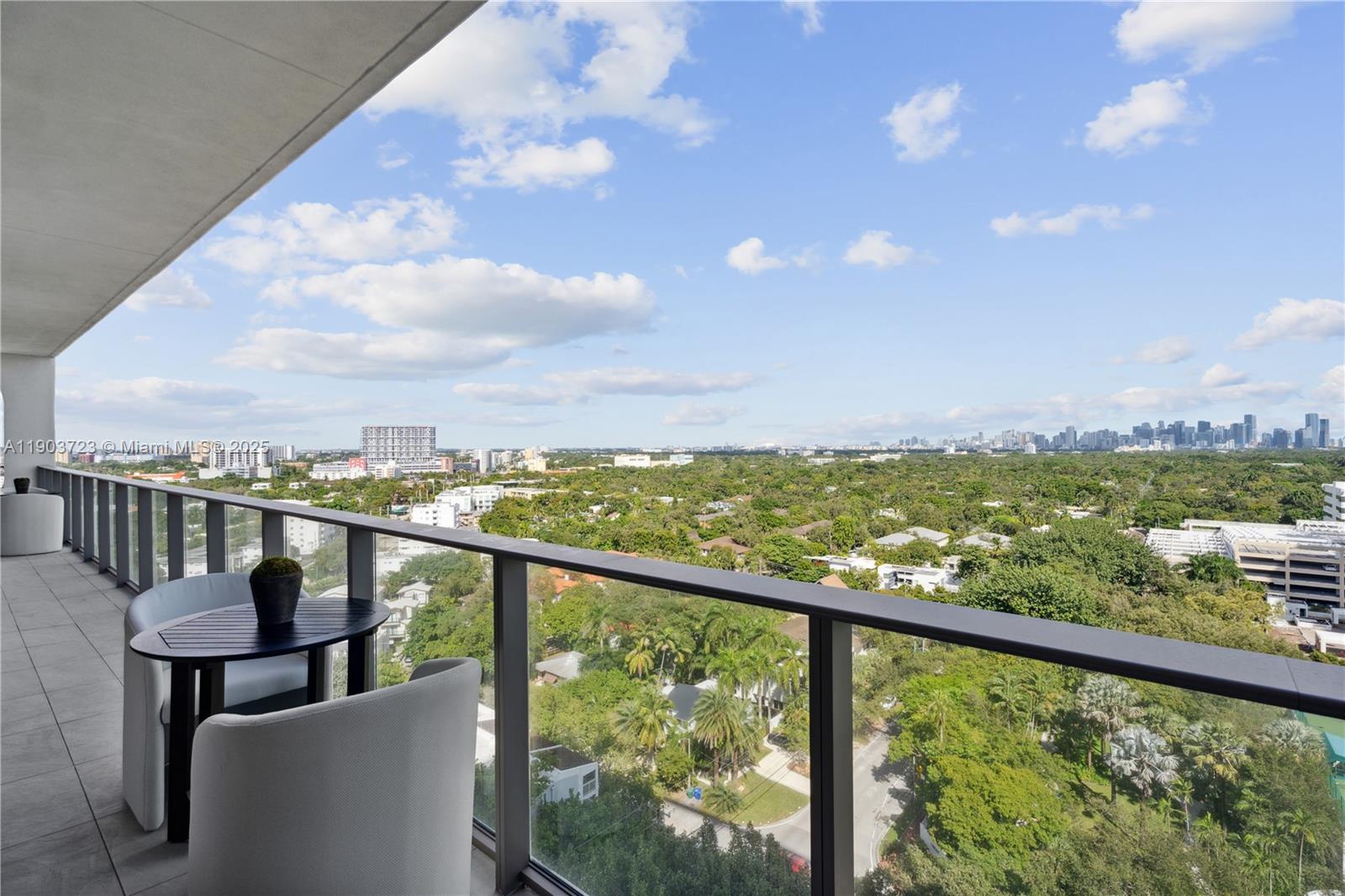 2678 Tigertail Avenue, Unit 1202 Miami, FL 33133 - Photo 20 of 20 a view of a city from a balcony