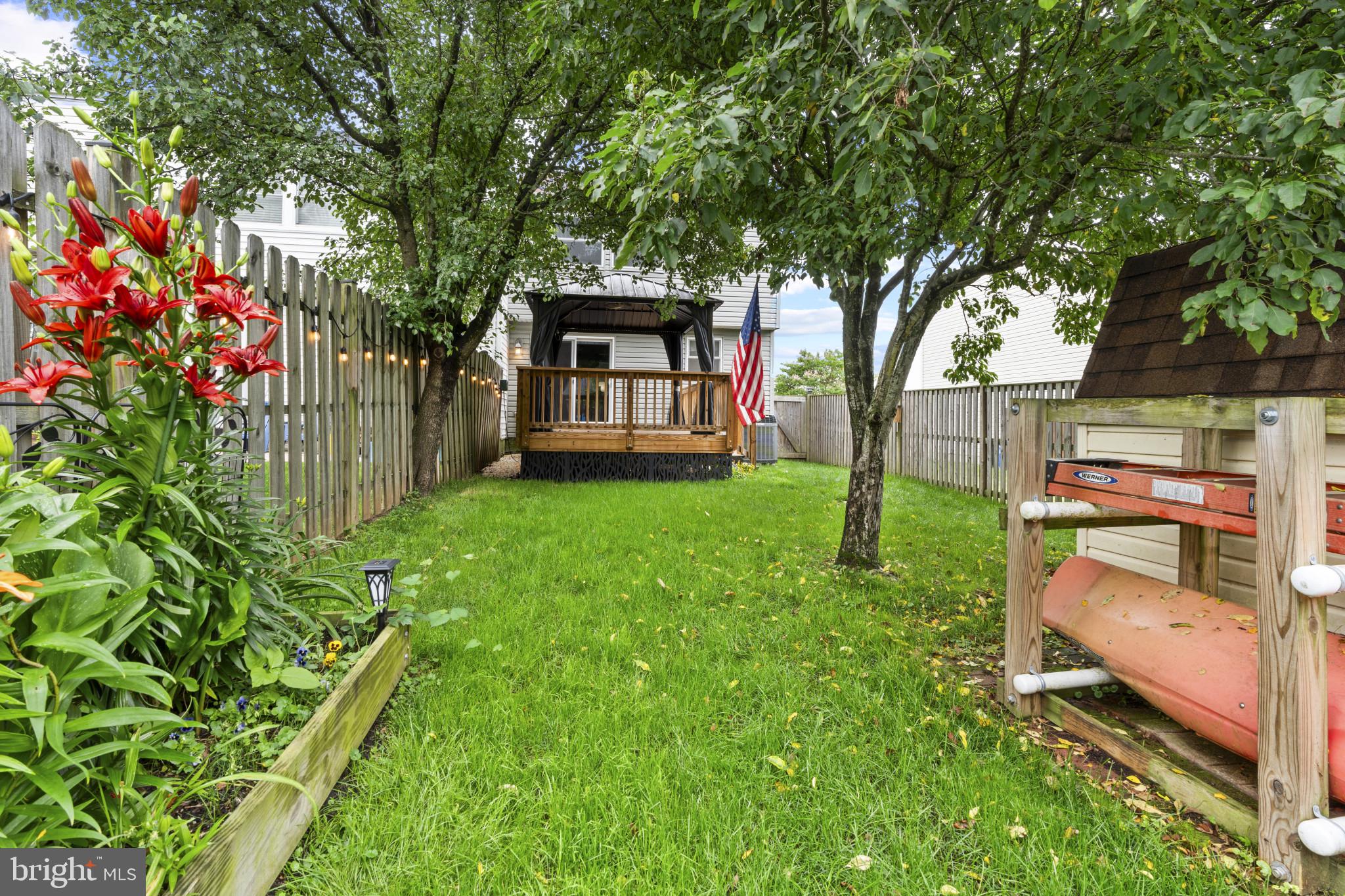 3210 Split Oak Court Abingdon, MD 21009 - Photo 17 of 17 a view of a house with backyard and a tree