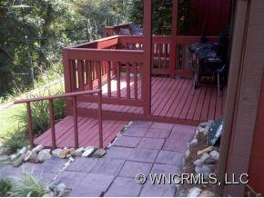 37 George Circle Maggie Valley, NC 28751 - Photo 4 of 15 a view of a wooden deck with a bench