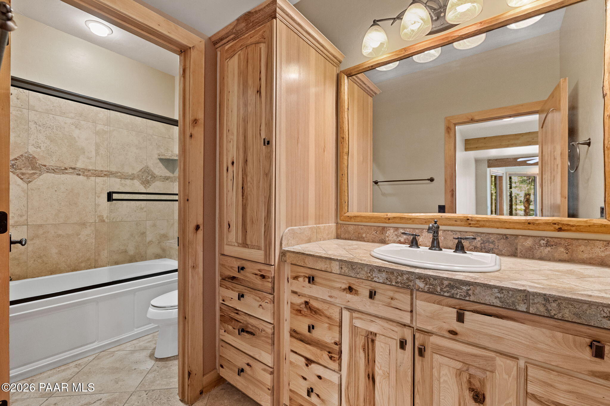 5140 East Charcoal Kiln Road Prescott, AZ 86303 - Photo 79 of 140 a bathroom with a granite countertop sink mirror and double