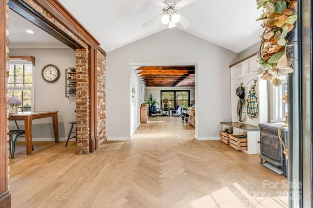 a view of a livingroom with furniture and a window