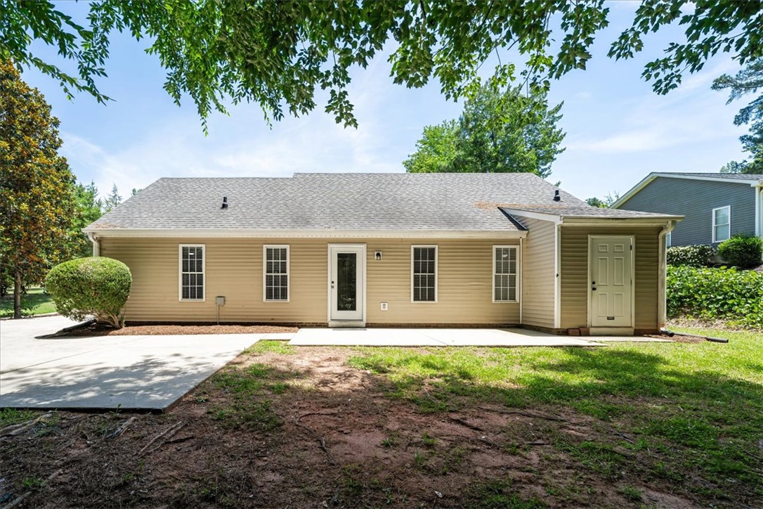 212 Blue Ridge Drive Clemson, SC 29631 - Photo 29 of 33 A spacious backyard with an ample patio provides ideal outdoor enjoyment.