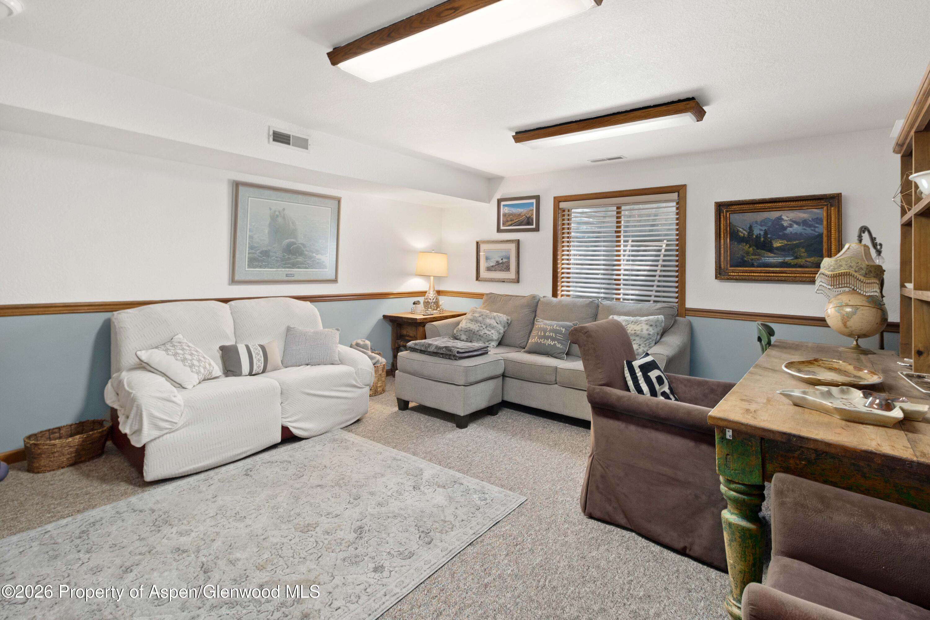 56 Sagewood Court Basalt, CO 81621 - Photo 13 of 24 lower level great room