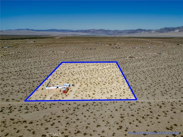a view of a swimming pool and an outdoor space