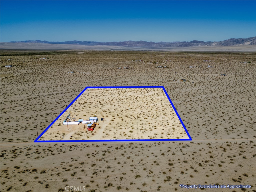 800 Brant Cross Road Twentynine Palms, CA 92277 - Photo 24 of 52 a view of a swimming pool and an outdoor space