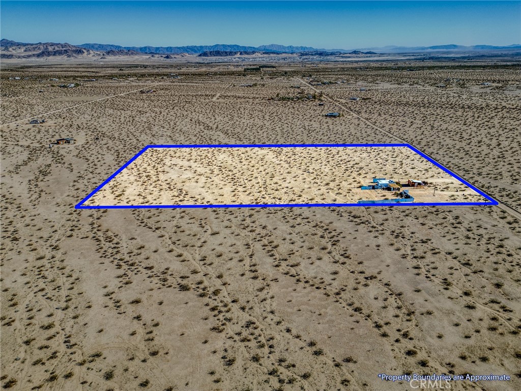 800 Brant Cross Road Twentynine Palms, CA 92277 - Photo 25 of 52 a view of an empty space and wooden floor