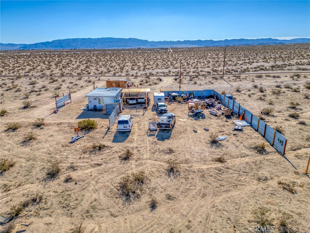 800 Brant Cross Road Twentynine Palms, CA 92277 - Photo 30 of 52 a view of roof with wooden floor