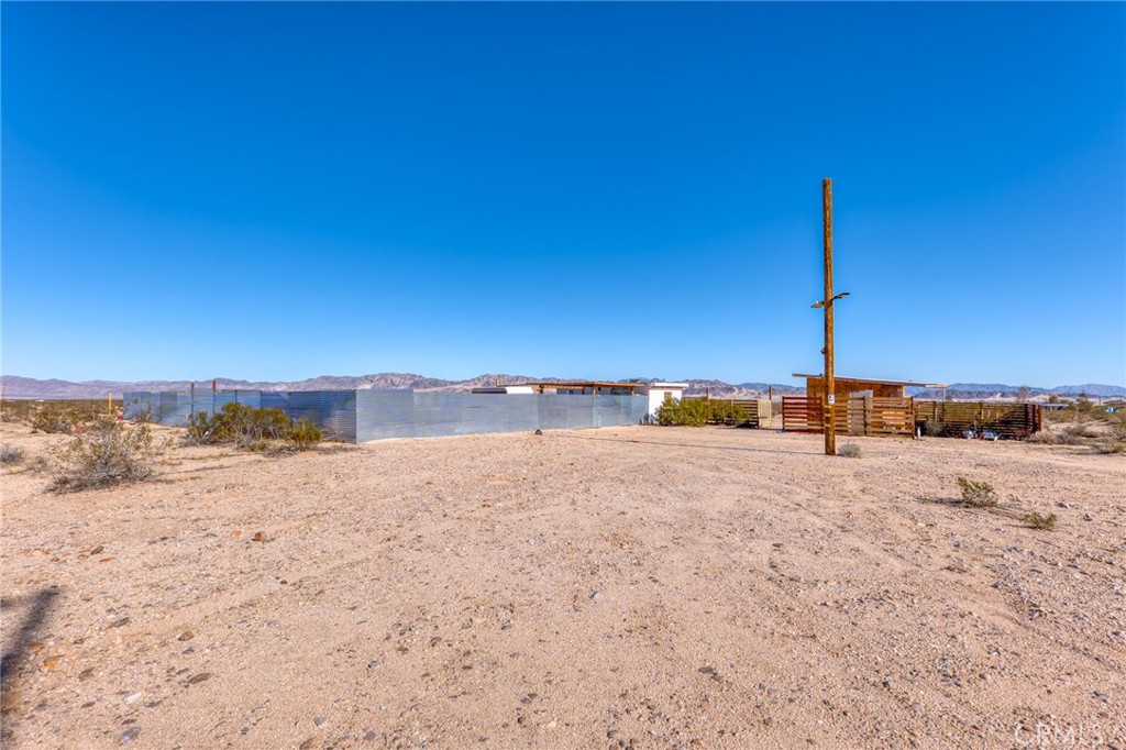 800 Brant Cross Road Twentynine Palms, CA 92277 - Photo 48 of 52 a view of a beach with a snow in the background