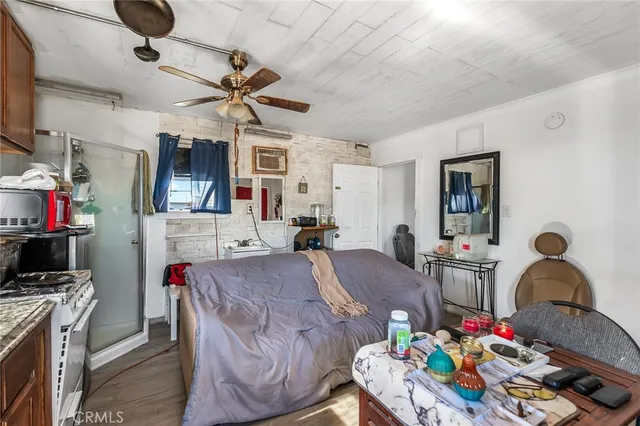 a living room with furniture and flat screen tv