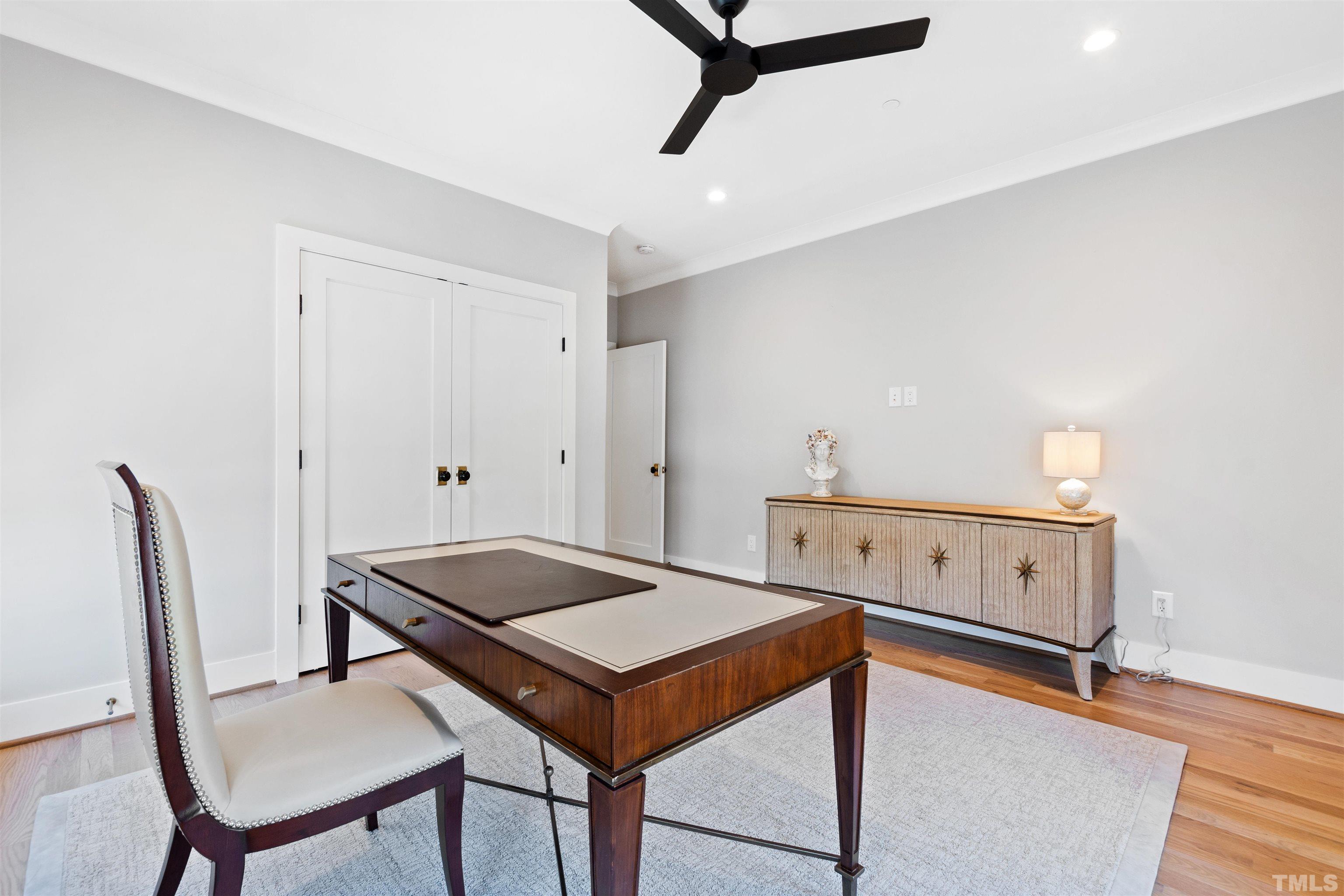 910 Oberlin Road, Unit 103 Raleigh, NC 27605 - Photo 25 of 47 a living room with furniture