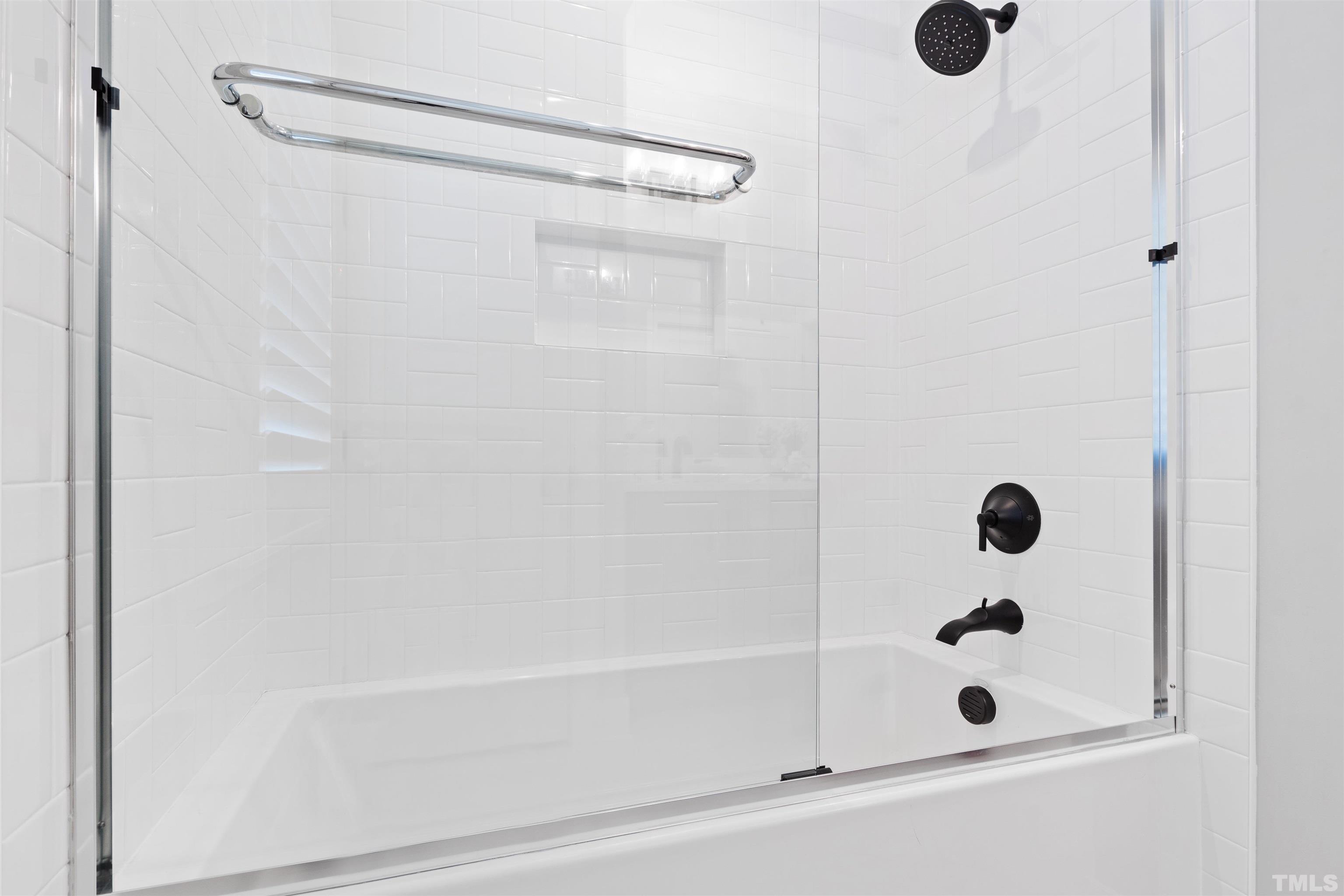 910 Oberlin Road, Unit 103 Raleigh, NC 27605 - Photo 30 of 47 a bathroom with a shower