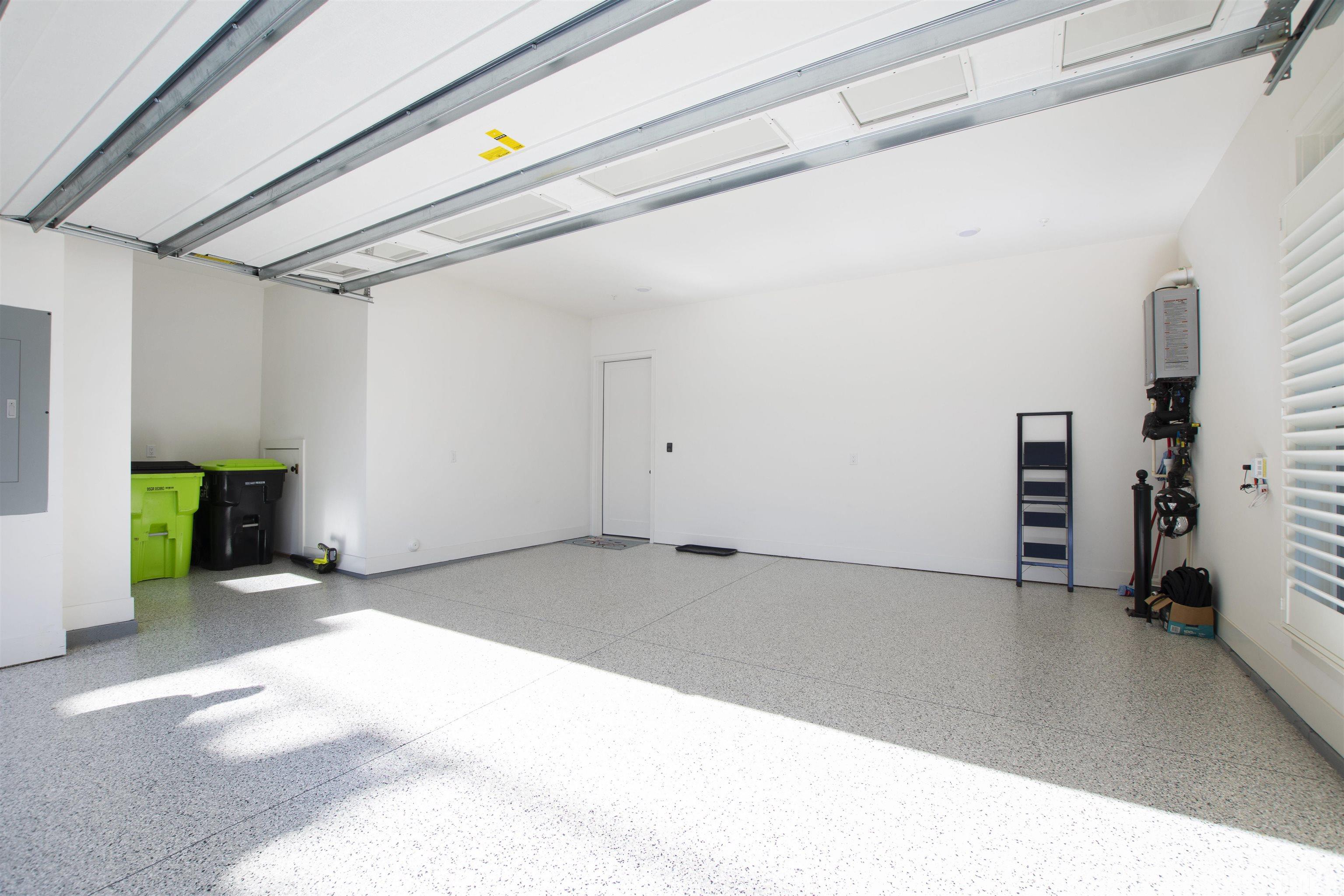 910 Oberlin Road, Unit 103 Raleigh, NC 27605 - Photo 40 of 47 a view of an empty room with window and stairs