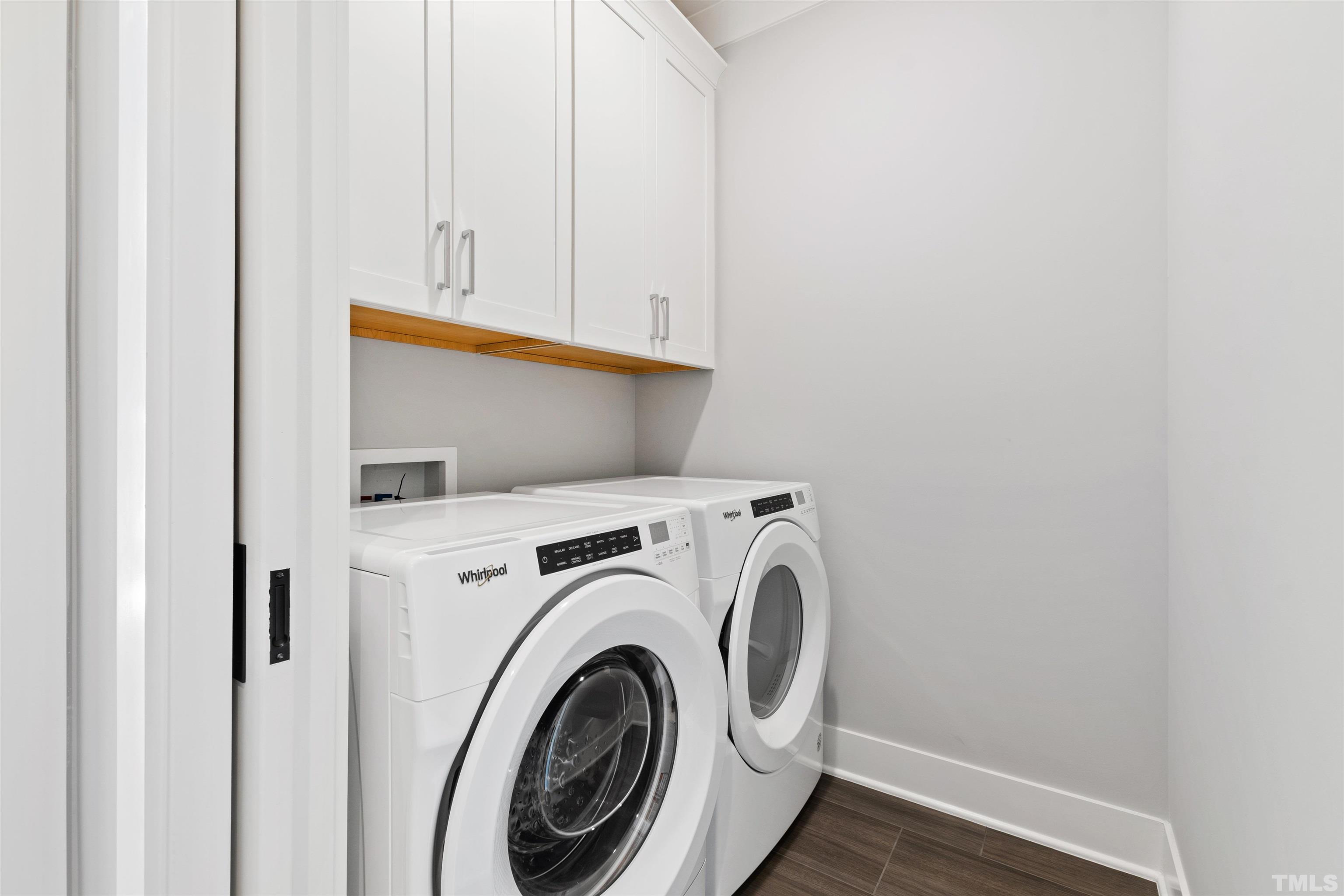 910 Oberlin Road, Unit 103 Raleigh, NC 27605 - Photo 45 of 47 a utility room with dryer and washer