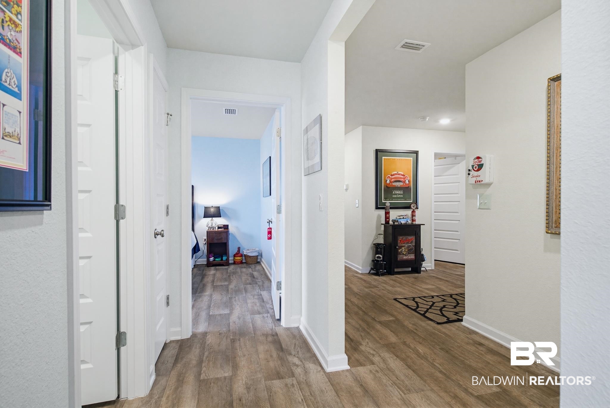 261 Fulham Lane Foley, AL 36535 - Photo 16 of 50 Corridor featuring baseboards and wood finished floors