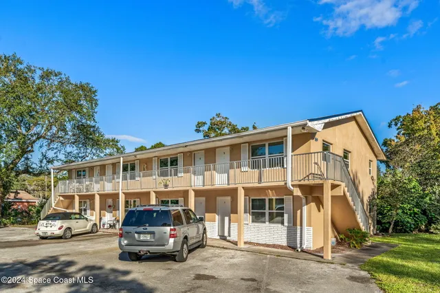 a car parked in front of a house