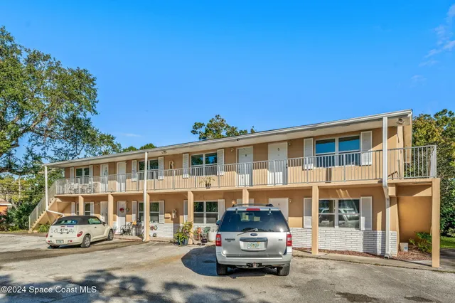 a car parked in front of a building
