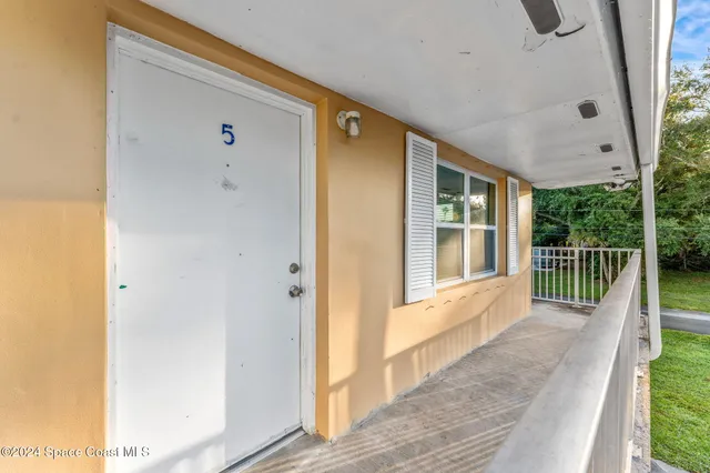 a car parked in front of a house