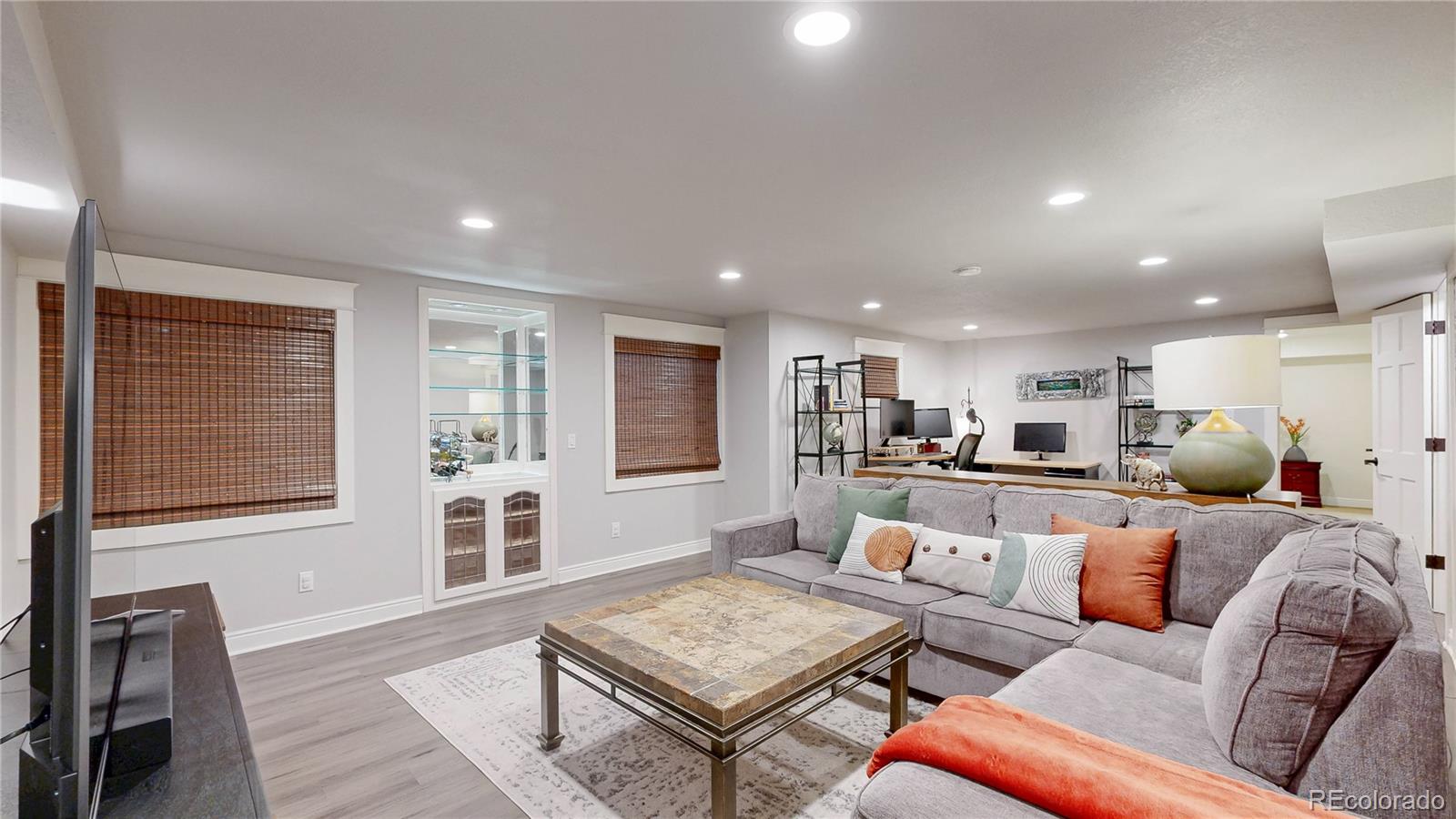 2335 Ranch Drive Westminster, CO 80234 - Photo 24 of 47 a living room with furniture and a window