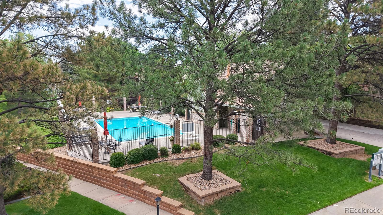 2335 Ranch Drive Westminster, CO 80234 - Photo 39 of 47 a view of a backyard with plants and a patio