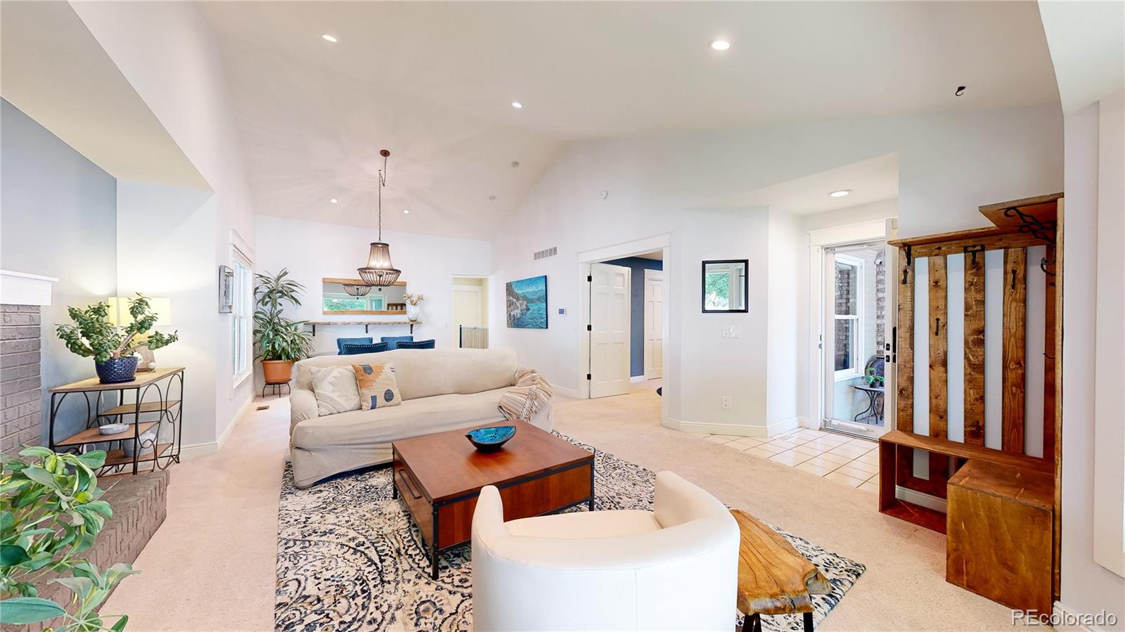 2335 Ranch Drive Westminster, CO 80234 - Photo 6 of 47 a living room with furniture and a large window