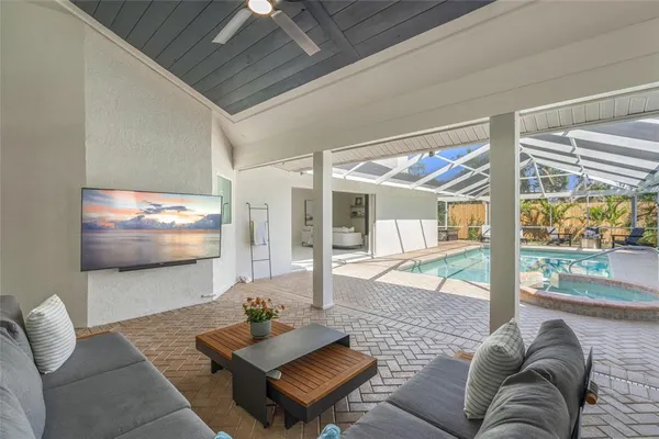a view of backyard with a patio and couches