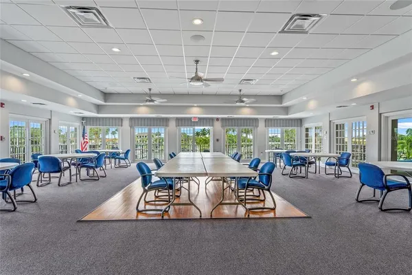 a large kitchen with stainless steel appliances granite countertop a refrigerator a oven a sink and dishwasher