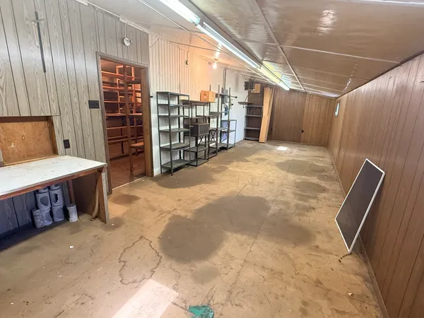 a view of a room with racks on the wall