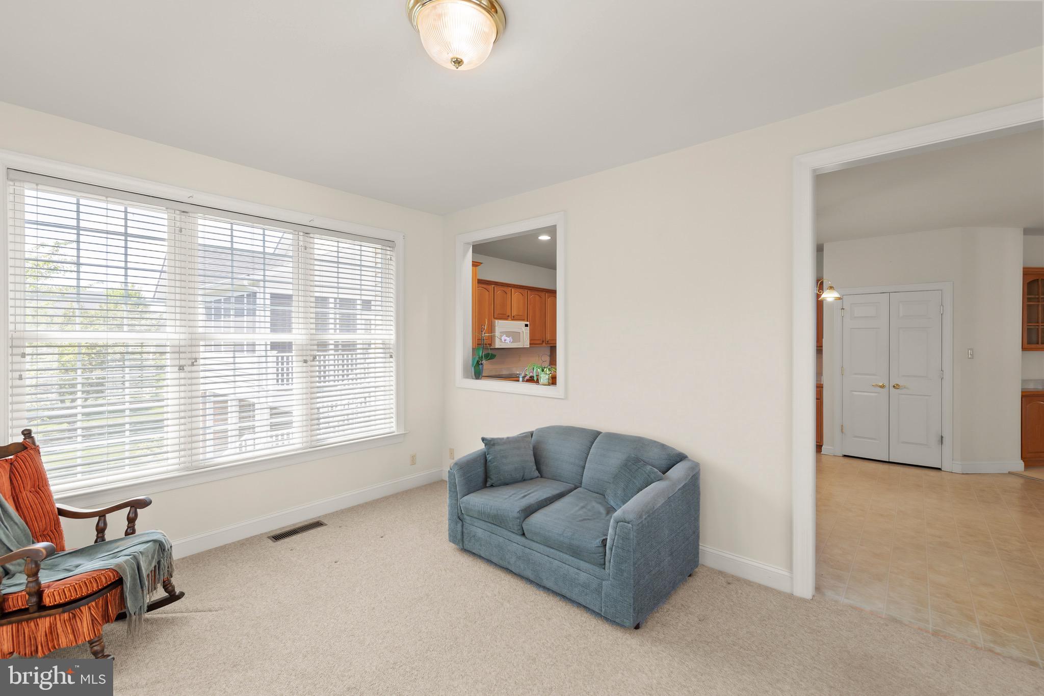 152 Harvest Ridge Drive Winchester, VA 22601 - Photo 13 of 43 a living room with furniture and a window