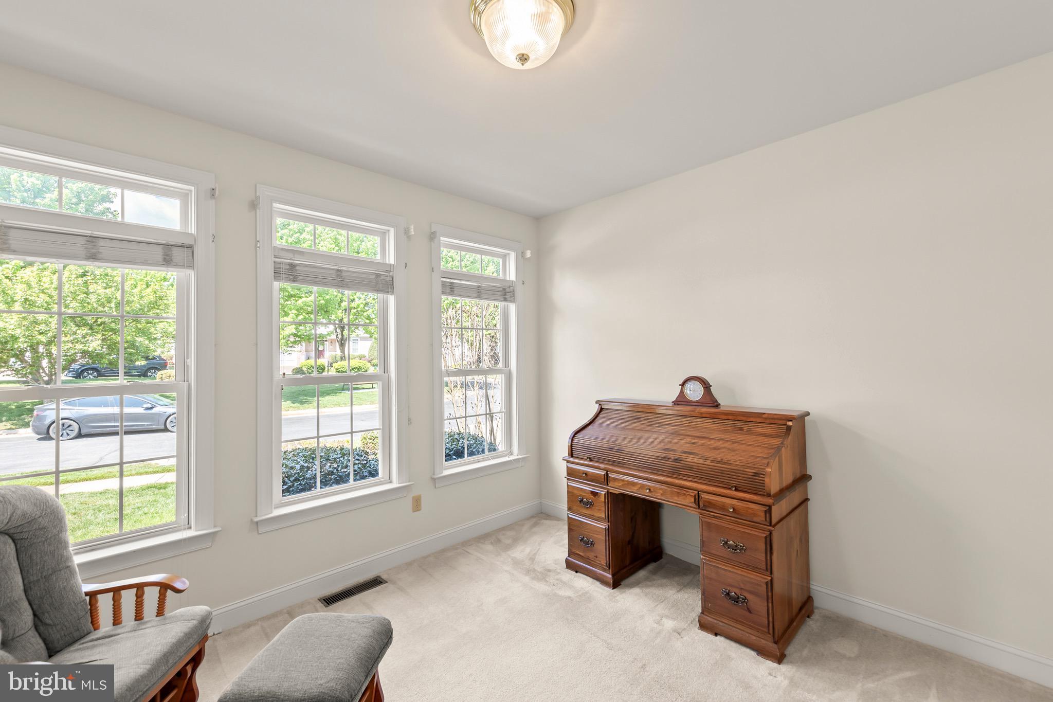 152 Harvest Ridge Drive Winchester, VA 22601 - Photo 23 of 43 a room with furniture and a window
