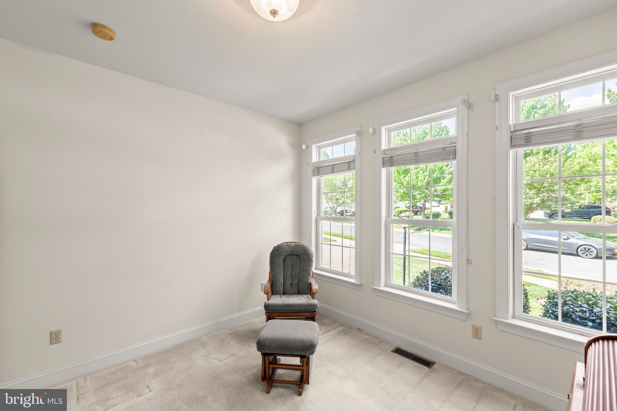 152 Harvest Ridge Drive Winchester, VA 22601 - Photo 24 of 43 a living room with furniture and a window