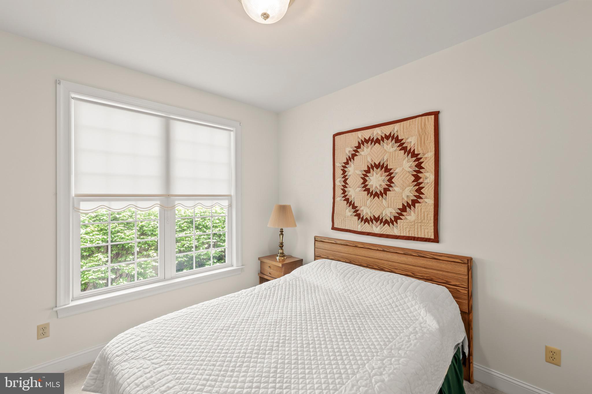 152 Harvest Ridge Drive Winchester, VA 22601 - Photo 26 of 43 a bedroom with a bed and a window