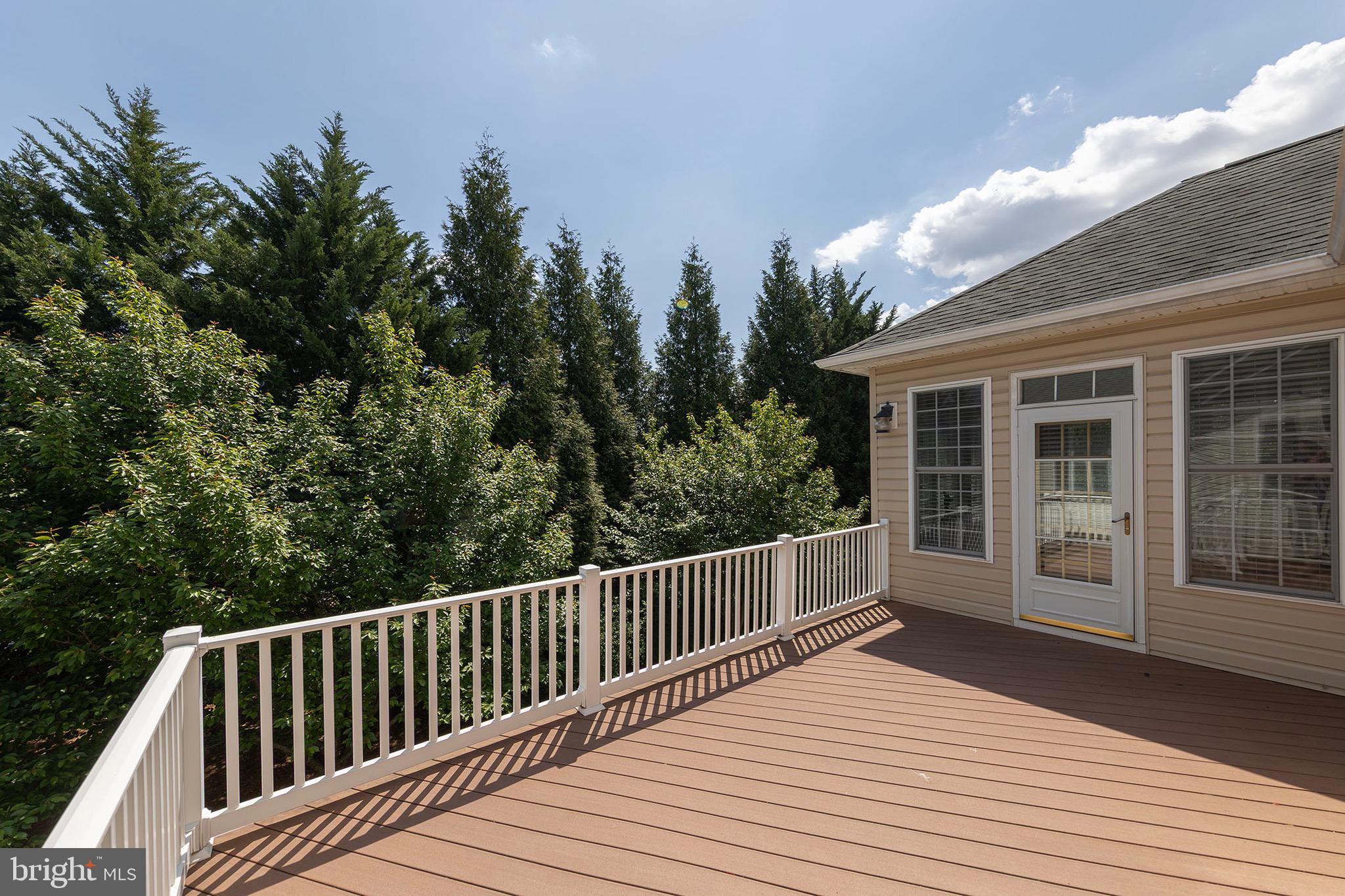 152 Harvest Ridge Drive Winchester, VA 22601 - Photo 31 of 43 a balcony with wooden floor and fence