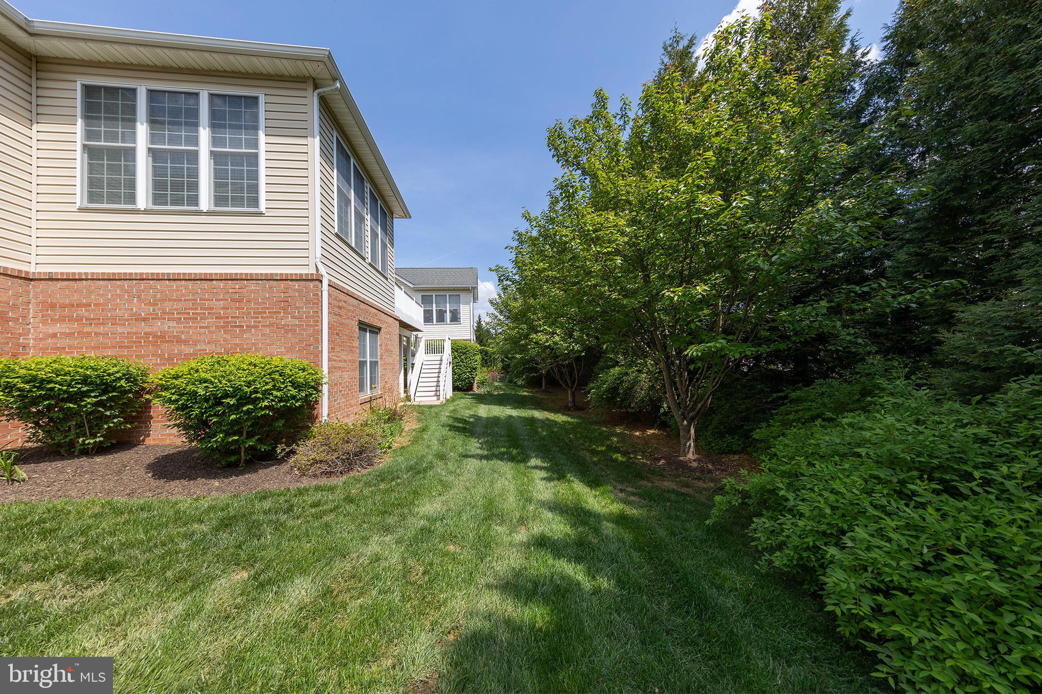 152 Harvest Ridge Drive Winchester, VA 22601 - Photo 39 of 43 a view of a house with a yard