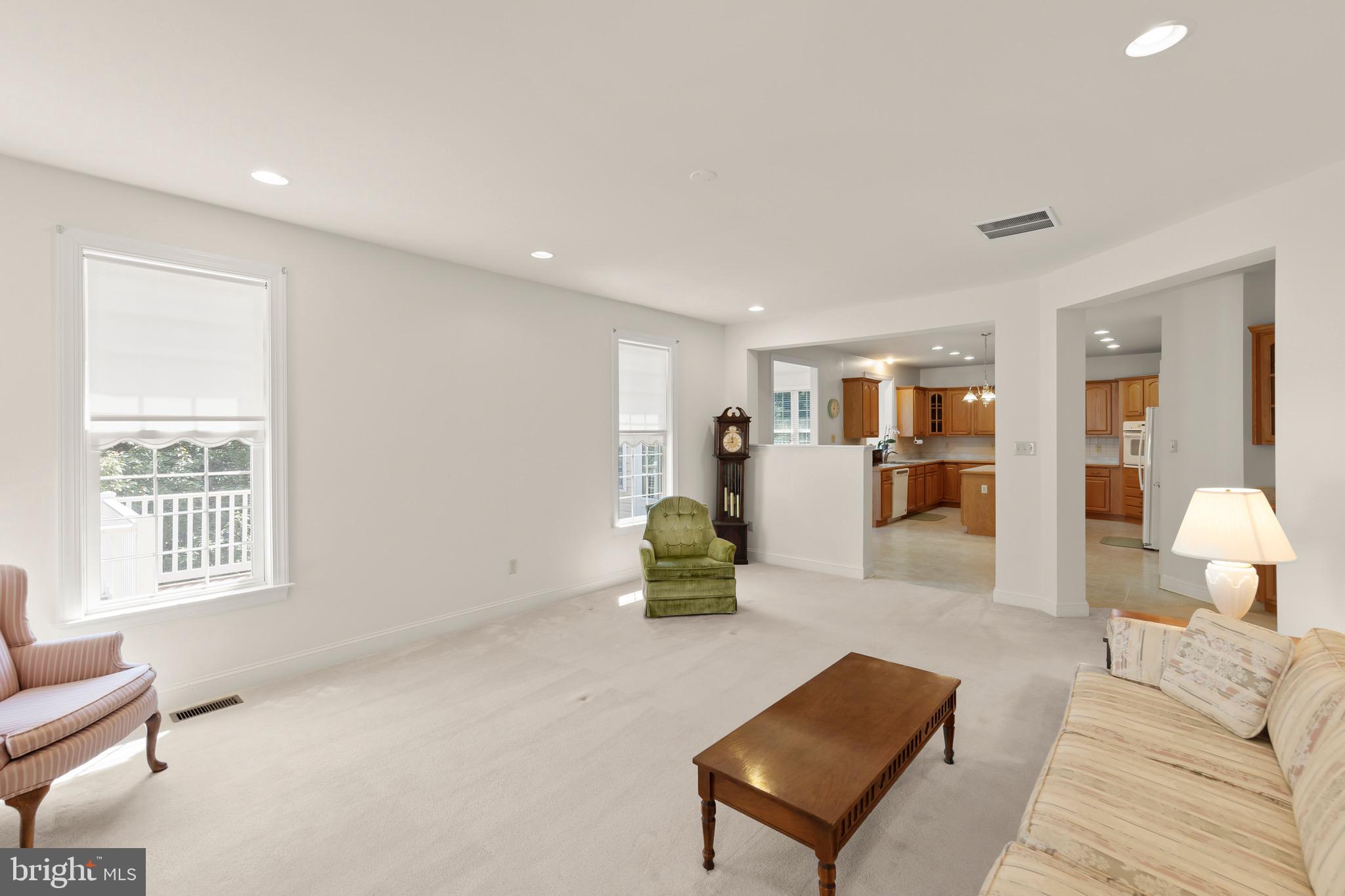 152 Harvest Ridge Drive Winchester, VA 22601 - Photo 4 of 43 a living room with furniture and a window