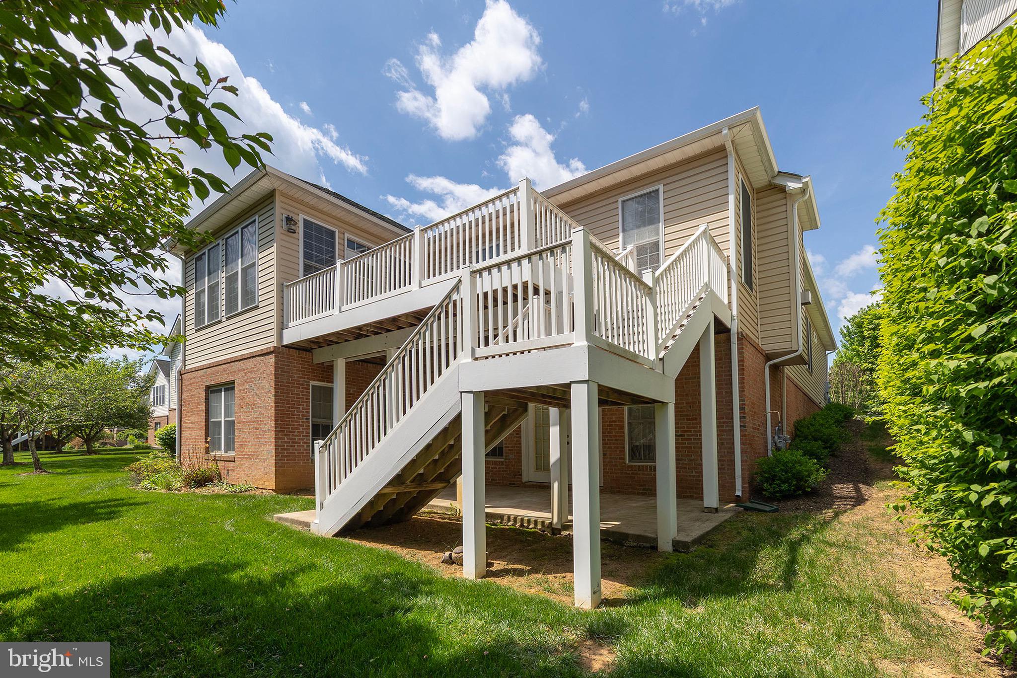 152 Harvest Ridge Drive Winchester, VA 22601 - Photo 41 of 43 a view of a house with a yard