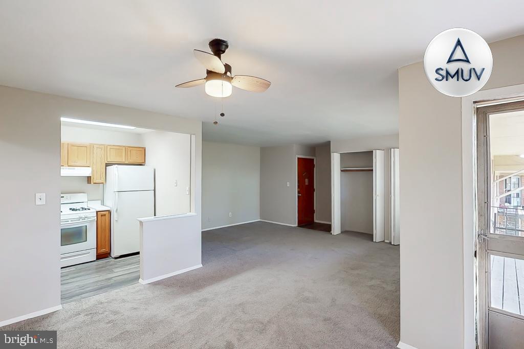 1504 Upshire Road, Unit F2 Baltimore, MD 21218 - Photo 1 of 22 a view of a livingroom with furniture
